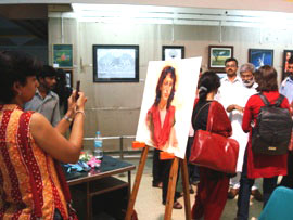 Demonstration of Portrait painting by Vasudeo Kamath